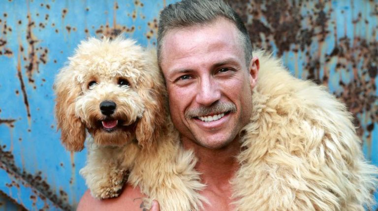 Australian Firefighters Pose with Rescued Dogs to Help Other Dogs Still in Need